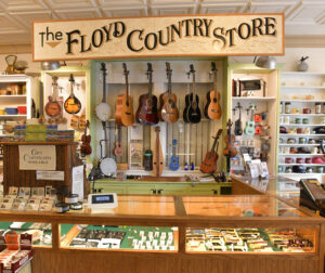 The Floyd Country Store display with instruments and a sign promoting the venue in Floyd, Virginia.